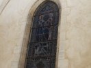 Un vitrail représentant le Christ et un arc brisé ( art gothique (...)
